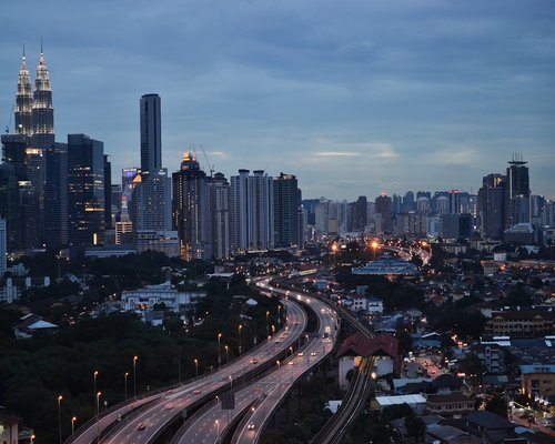 Traffic in Kuala Lumpur showing cars on a busy evening
